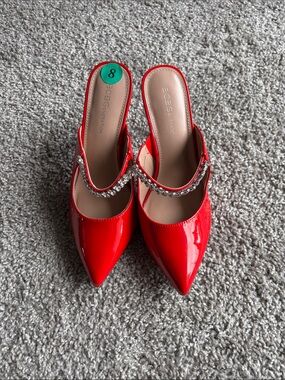 BCBGeneration Red Patent Pointed Mules with Crystal Chain